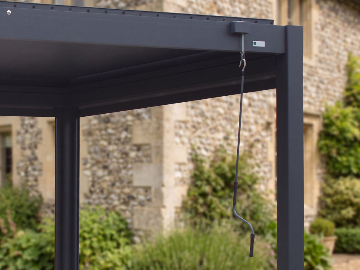 LuxSol Aura 3x4 · Manual crank detail · Real manual crank and roof/beam detail · Furniture and optional accessories shown for styling