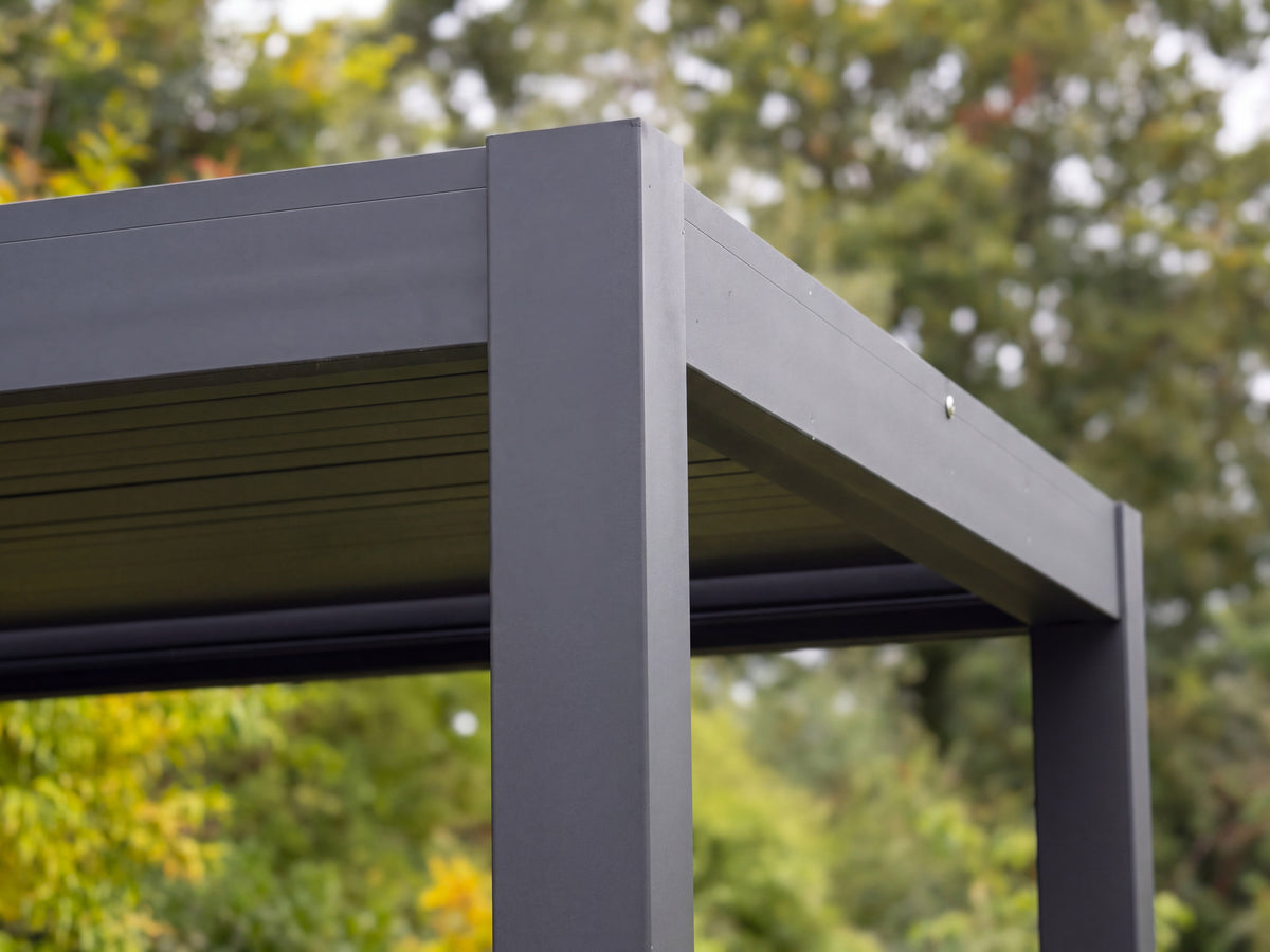 LuxSol Aura 3x4 gallery · Detail photographed on a 3 × 3m Aura · Editorial beam and post detail · Real 3 × 3m Aura beam/post junction · closed roof · dedicated editorial detail · Furniture and optional accessories shown for styling