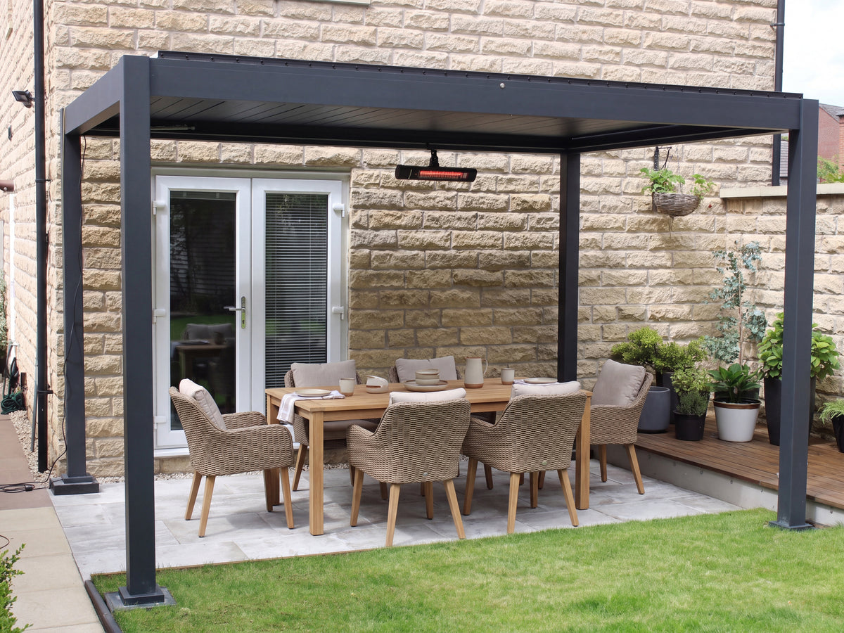 Como pergola over an outdoor dining area on a stone patio
