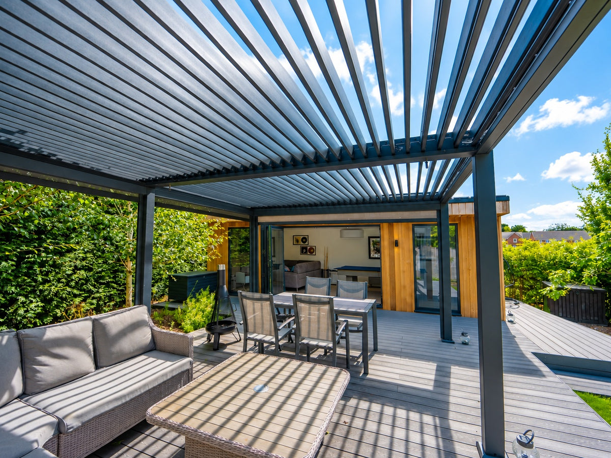 Outdoor living, styled around Tora. Screens, walls and heaters shown are optional; furniture is not included.