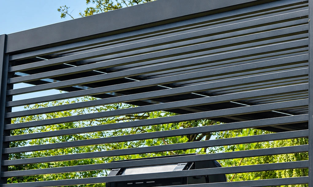 Close-up of fixed aluminium slats on a Tora pergola privacy wall