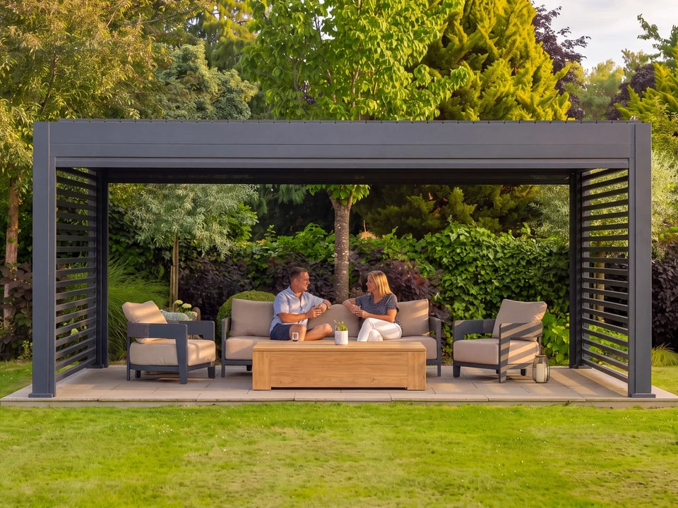 Styled Tora pergola with a couple relaxing in a garden