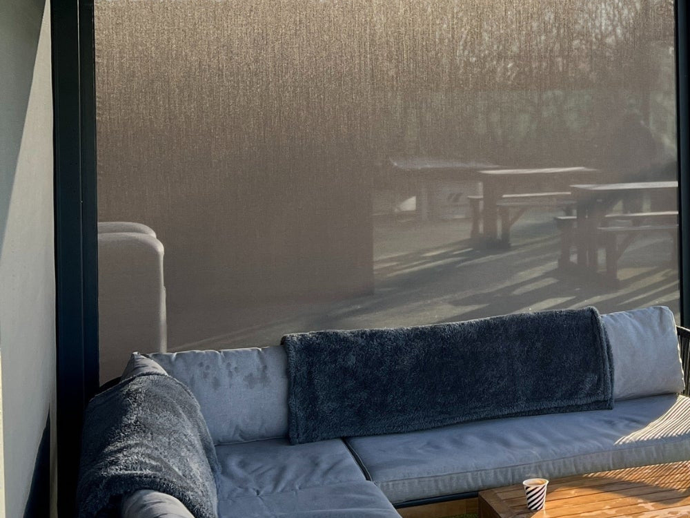 Real screen fabric viewed from inside, showing light and visibility through the material