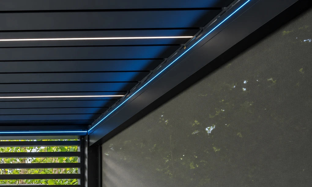 Close-up of thin blue perimeter lighting and white louvre lighting on a Tora pergola