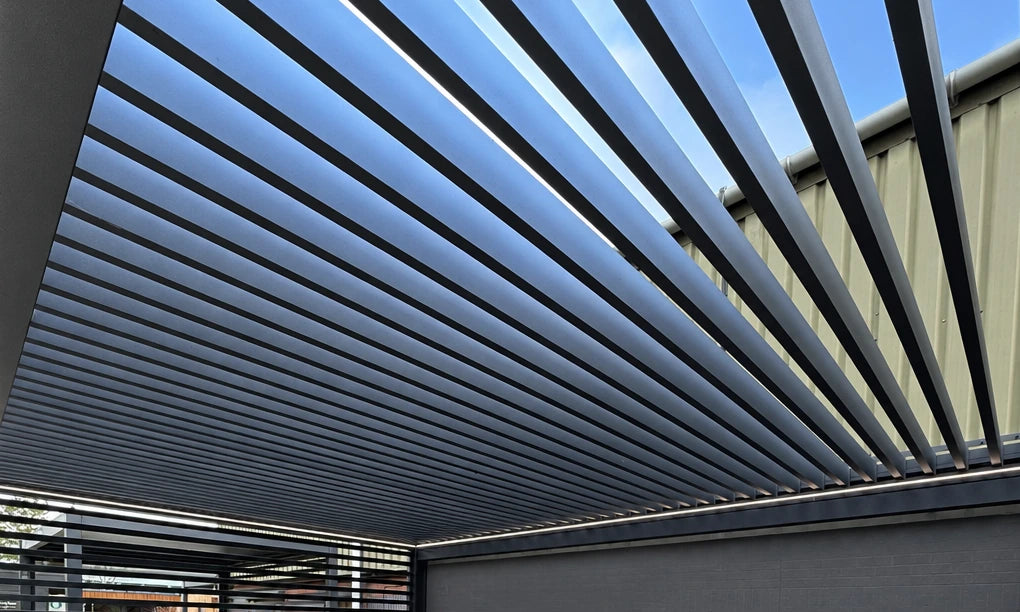 Close-up of adjustable aluminium roof louvres on a Tora pergola